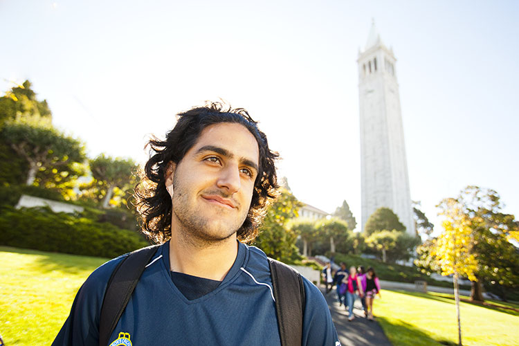 Student by the Campanile.